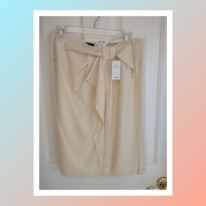 Cream color pencil skirt. Size 12 Banana Republic. New with a tag.
